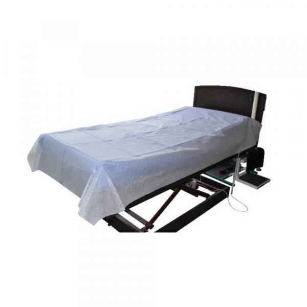 Drap de lit à usage unique ABENA pour le protection de la literie à l'hôpital et en clinique.